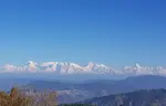 Mukteshwar is a village which sits high on the Kumaon Hills in Nainital district of Uttarakhand, India. It is at an elevation of 2,171 m 