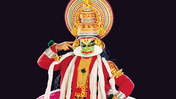 Kathakali is the traditional dance from Kerala. Kathakali includes a mythological story being depicted through intense foot and hand movements and face expressions.