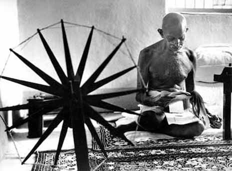 Gandhi with charkha